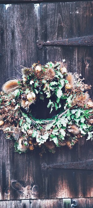 Dried wreath on a wooden door