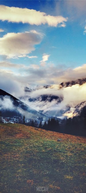 Town in a foggy mountain valley