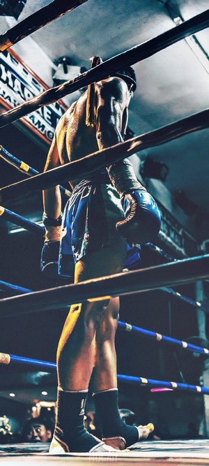 Male Boxer Standing in Ring in Chiang Mai