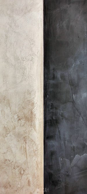 Textured wall with two contrasting finishes