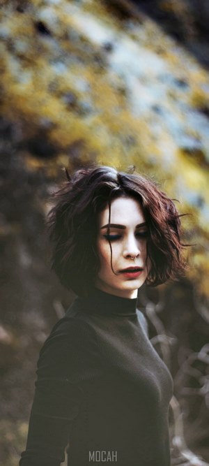 Woman with nose piercing and red lipstick