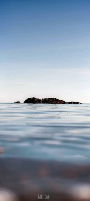 Lonely rock island in the ocean