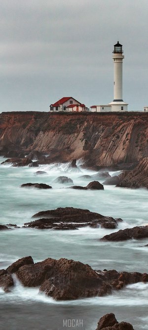 Point Arena Lighthouse on a cliff overlooking the ocean