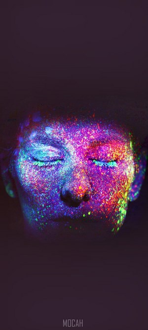 Face covered in UV paint