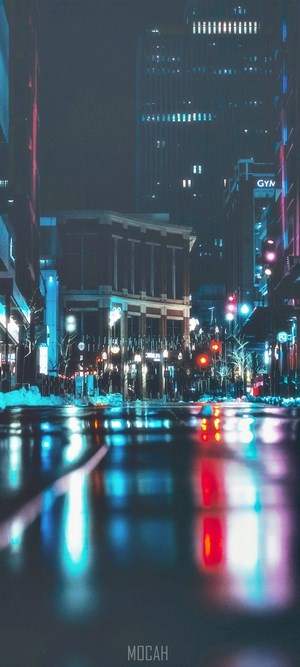 Night city street with reflections and lights