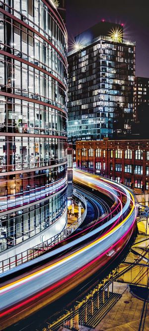 Cityscape at Night with Light Trails
