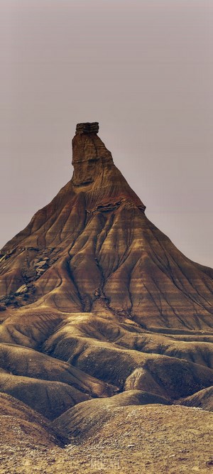 Desert Butte with Eroded Slopes