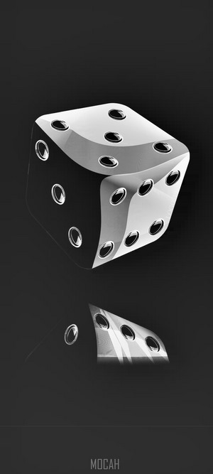 A grayscale image of a die with a reflection