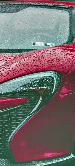 Red McLaren with Water Droplets on Headlamp