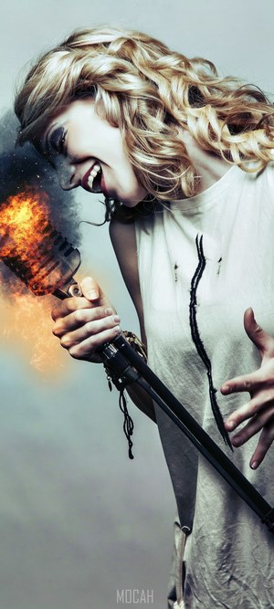 Woman singing into a microphone on fire
