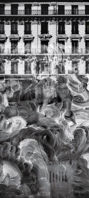 Building facade reflected in smeared window in Lyon