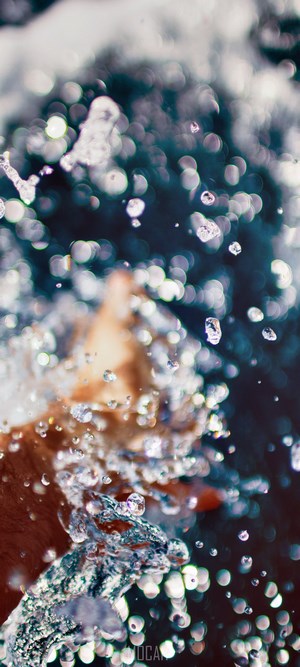 Water splashes with bokeh effect