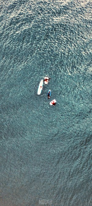 People on surfboards in the ocean