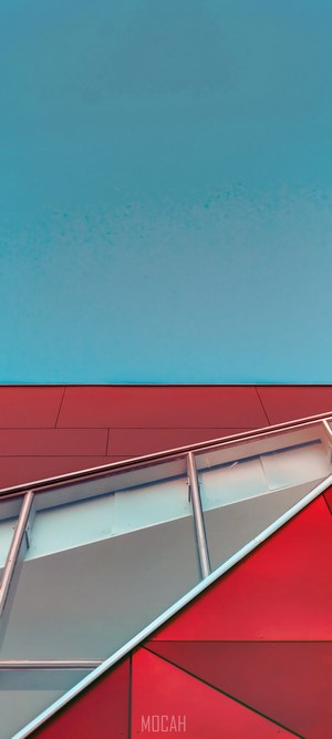 Modern building with red panels and glass staircase