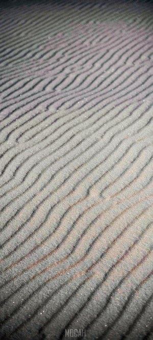 Sand dunes with wave patterns