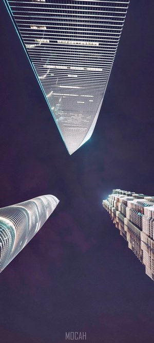 Three skyscrapers in Shanghai at night