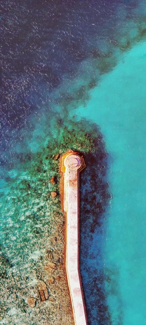 Drone shot of a jetty on a coral reef