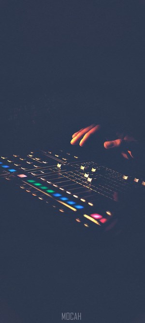 Hands on a music production controller
