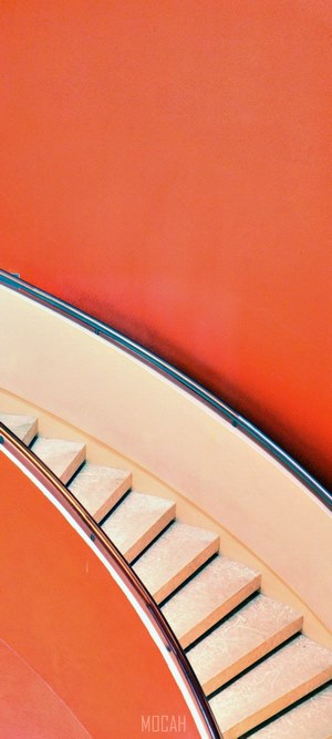 Orange Spiral Staircase with Marble Steps