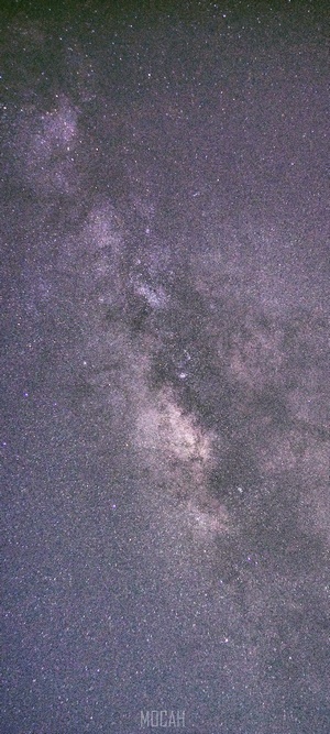 Milky Way galaxy with stars and purple hues
