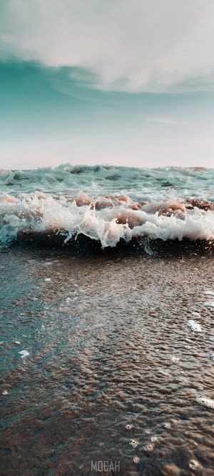 Ocean wave crashing on the shore