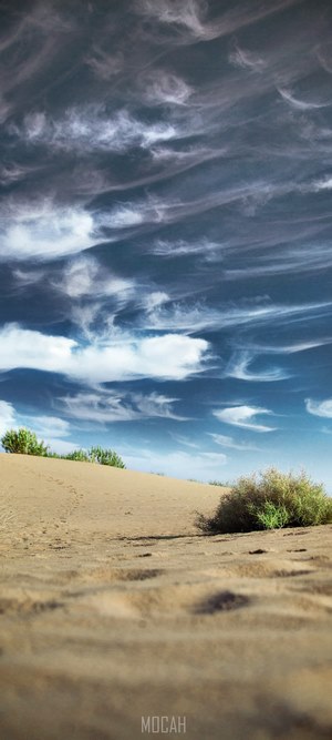 Sand dunes and clouds