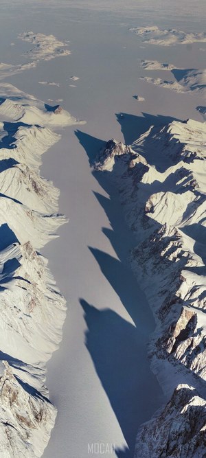 Aerial view of a snow-covered mountain valley