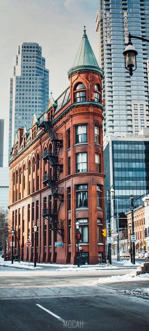 Flatiron Building in Toronto with modern skyscrapers