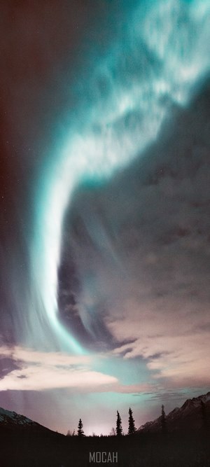 Aurora Borealis over Alaskan mountains