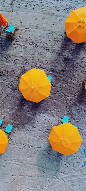 Beach umbrellas and chairs from above
