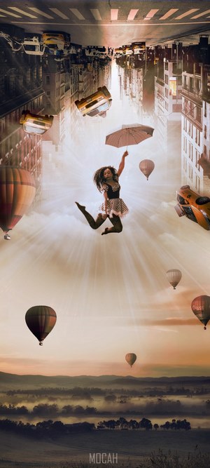 Woman jumping with umbrella among hot air balloons and upside-down city