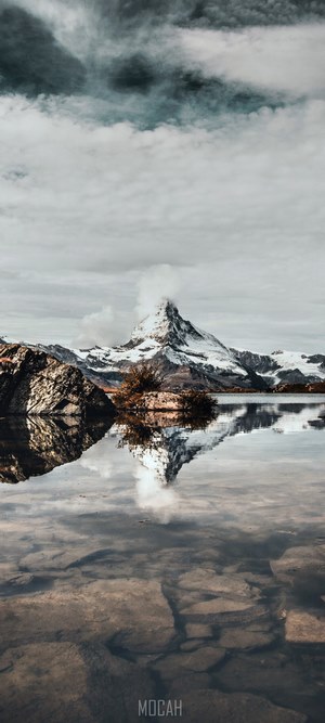Snow-capped mountain reflected in a lake