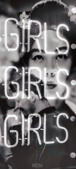 Neon 'Girls' sign over Japanese women