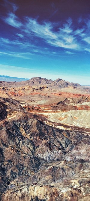 Desert mountains under a blue sky