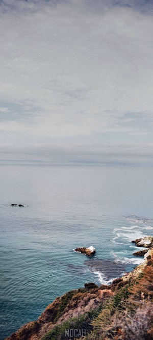 Rocky coastline with ocean and sky
