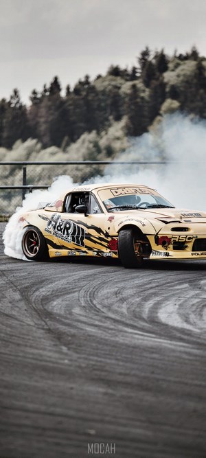 Yellow Mazda MX-5 Drifting with Smoke