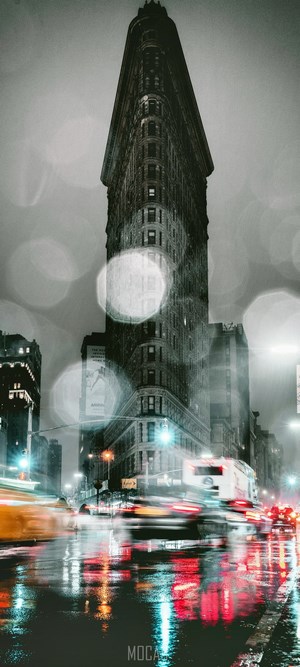 Flatiron Building in New York City on a Rainy Night