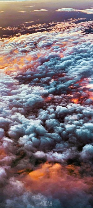Clouds at sunset with orange and blue hues