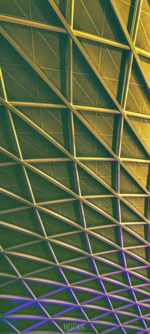 Illuminated modern facade meshwork of steel beams