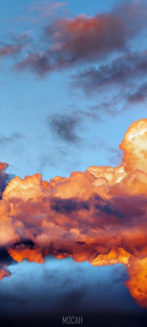 Orange and purple clouds in a blue sky