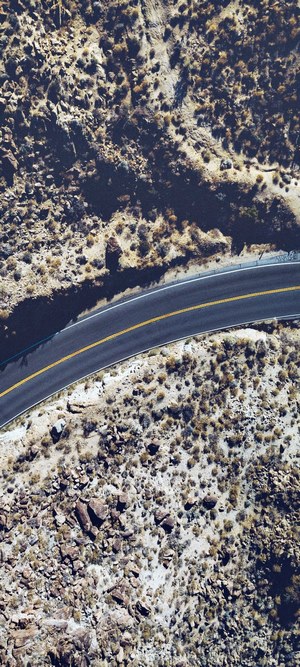 Curved road in a rocky, arid landscape