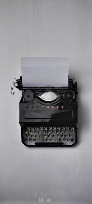 Vintage Favorit typewriter with paper