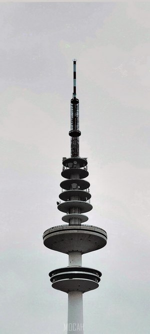 Communications tower in Hamburg against a cloudy sky
