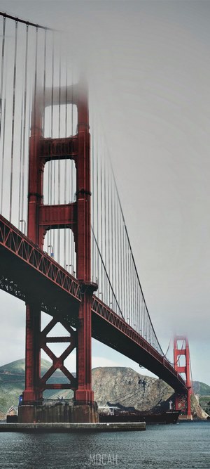 Golden Gate Bridge partially obscured by fog