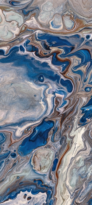 Abstract acrylic paint pour with blue and grey marbling