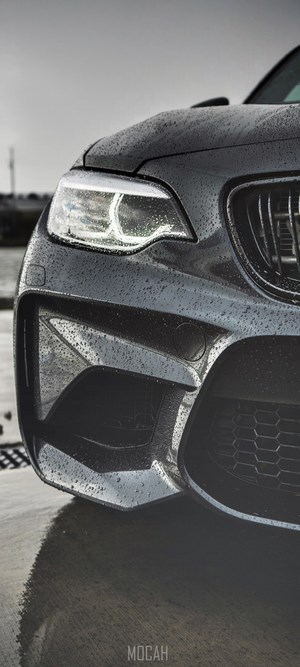 BMW car front with water droplets