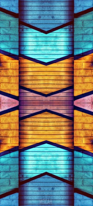 Symmetrical abstract pattern with blue and orange brick textures