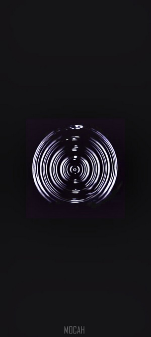 Concentric circles of light on black background