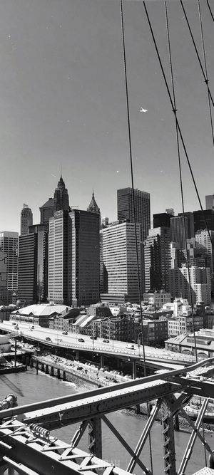 New York City skyline with Brooklyn Bridge cables