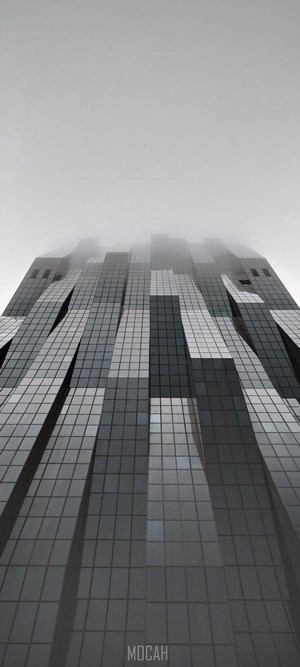 Modern skyscraper in fog